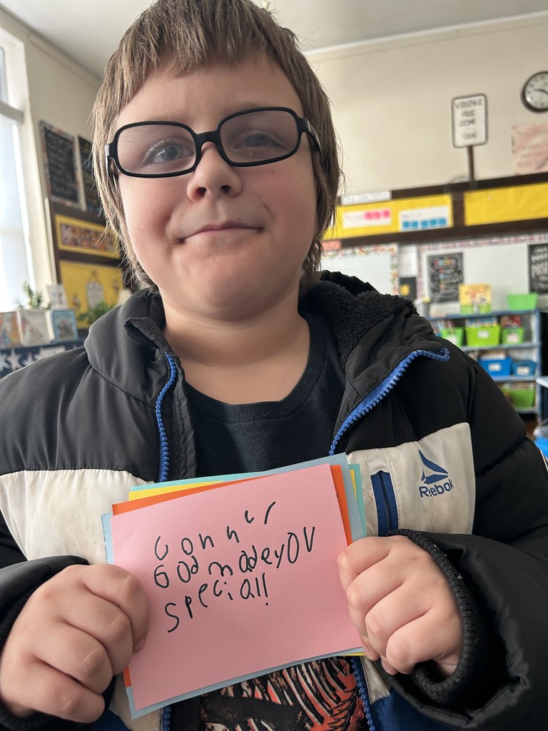 Boy with kindness card