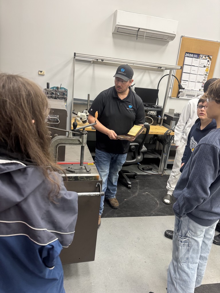 Person showing CAD parts