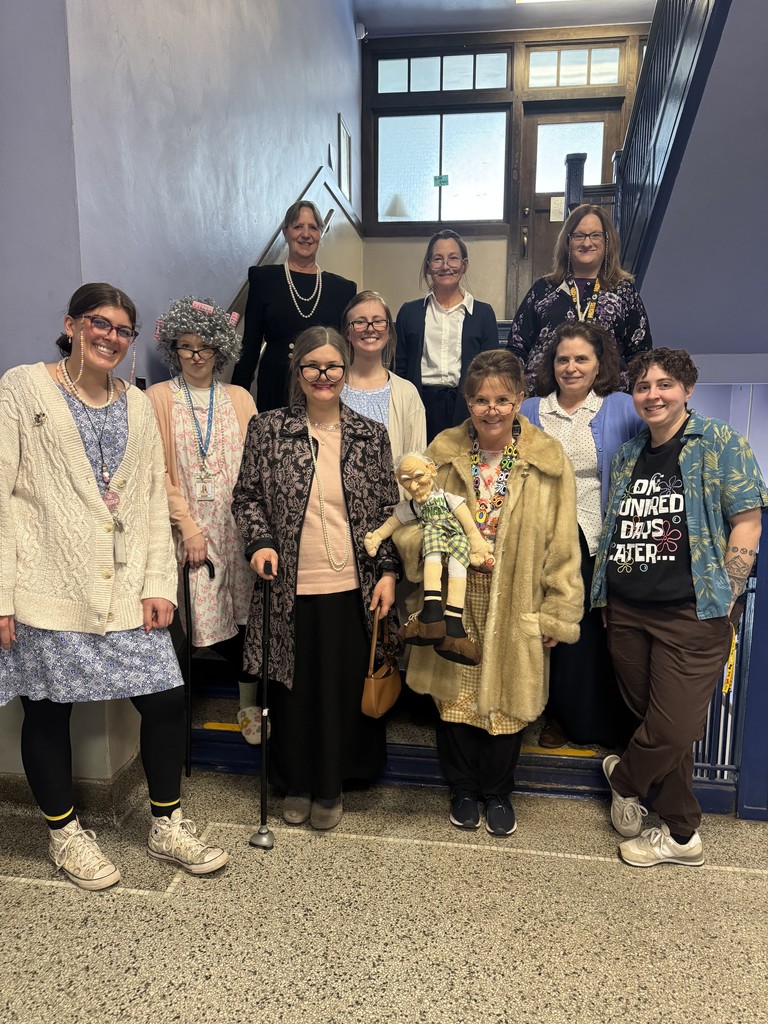 picture of teachers dressed as elderly for 100th day of school celebration