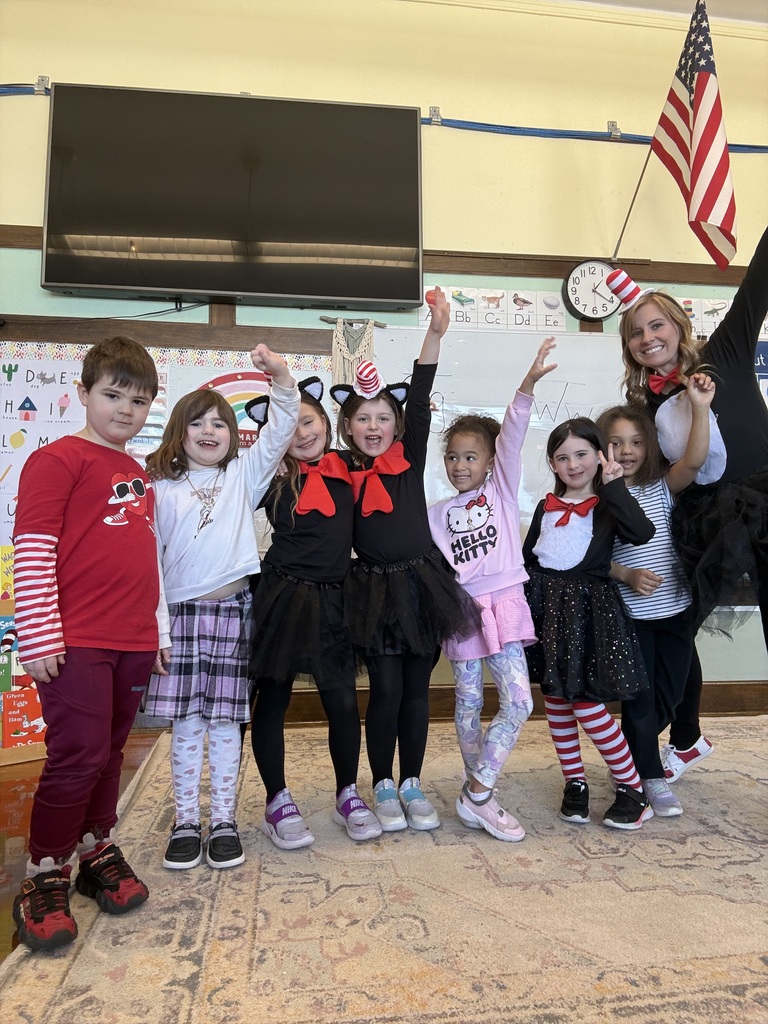 Kindergarten students and teacher posing for Dr. Seuss Day