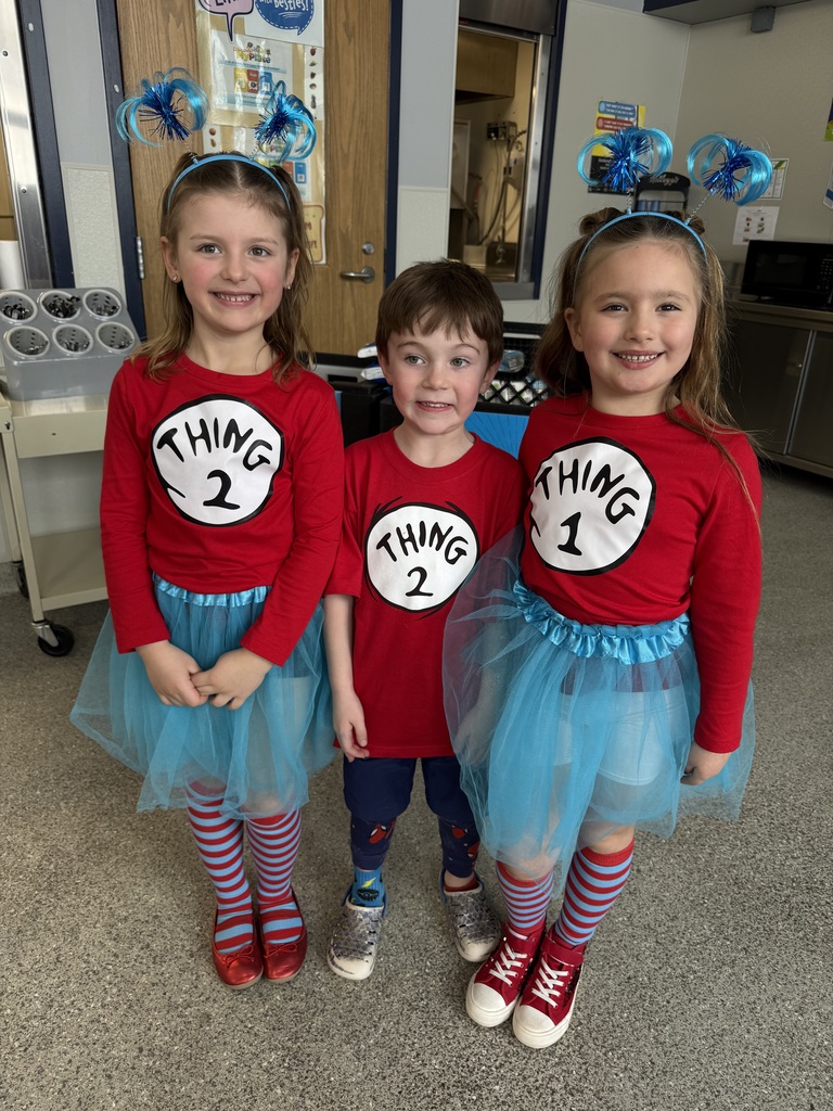 3 students dressed as Things 1, 2 and 3