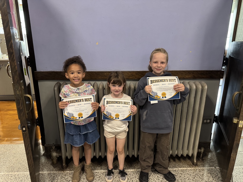 2 girls and 1 boy holding certificates for Bessemer's Best awards