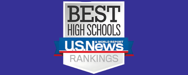 A graphic badge with a silver shield background and a blue border ribbon. At the top, bold black text reads “BEST HIGH SCHOOLS.” Across the middle, a blue, white, and red banner displays the logo “U.S. News & World Report.” At the bottom, gray text on the shield reads “RANKINGS