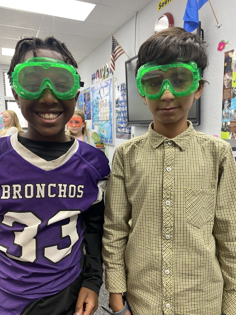 2 boys with safety googles on