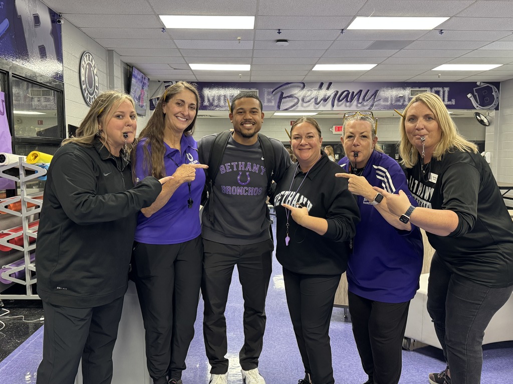 093025 teachers dressed up like Coach Holliday for spirit week