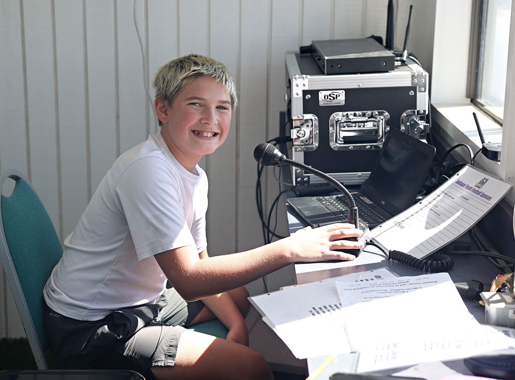 pic of student announcing a football game in press box