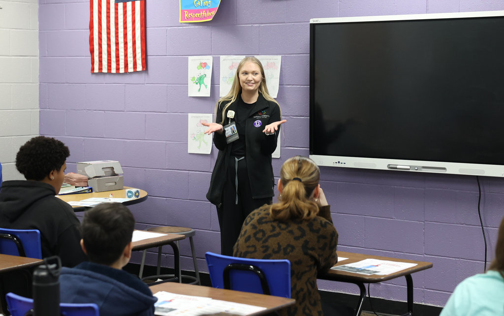 photo of dietitian speaking to class of middle school students