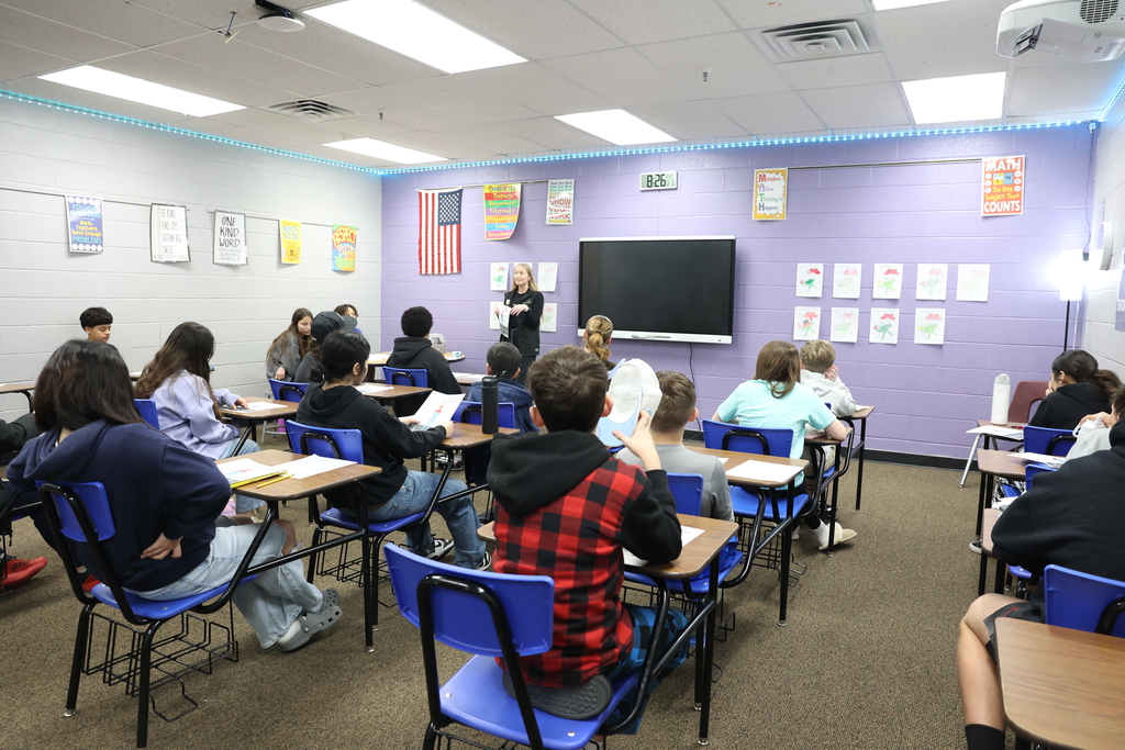 photo of dietitian speaking to class of middle school students