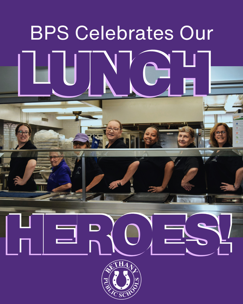 Staff members in a school cafeteria stand in a line behind the serving counter, smiling with hands on hips. Purple graphic text reads, “BPS Celebrates Our Lunch Heroes!” with the Bethany Public Schools logo at the bottom.