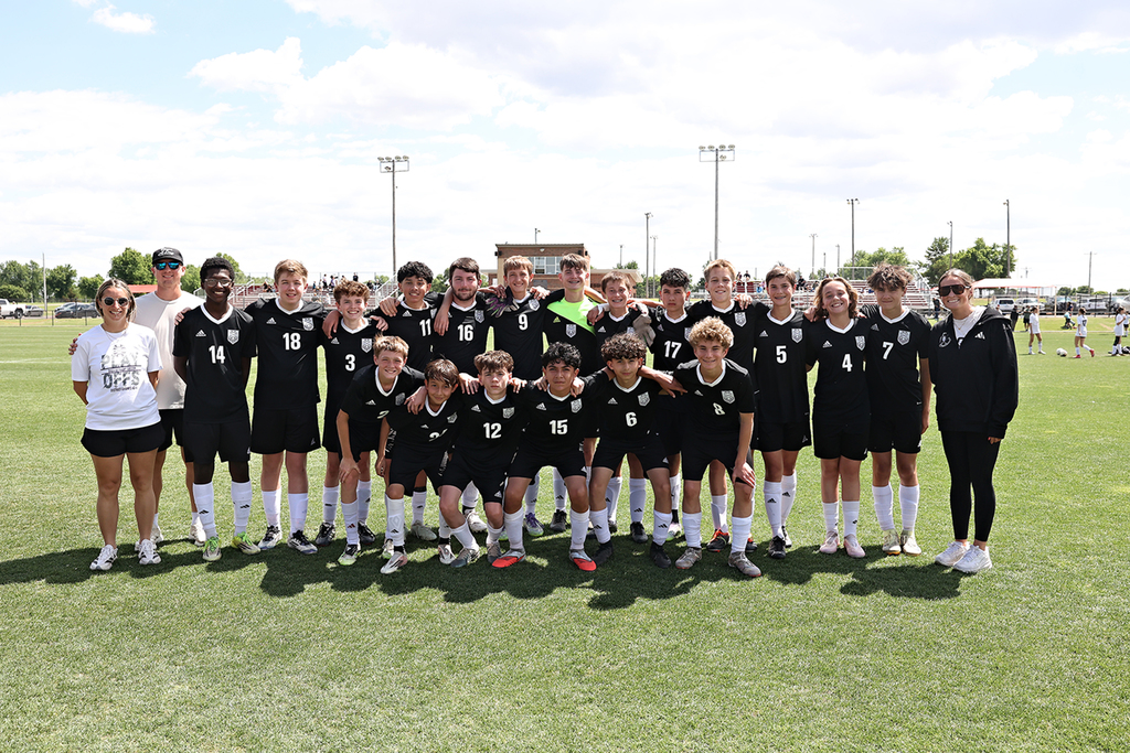 picture of boys soccer team after win