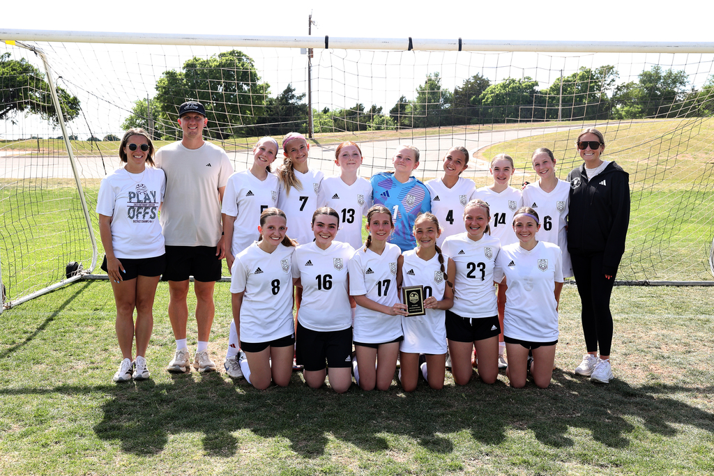 picture of girls soccer team after the win