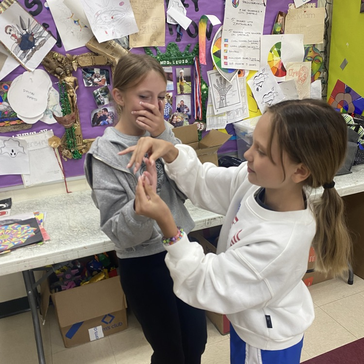 6th Grade Art students creating beautiful sculptures!