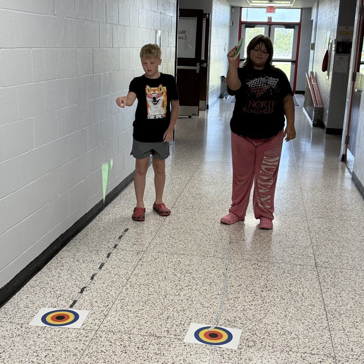 6th grade PLTW making paper airplane gliders to learn about the design process and using an engineer’s notebook to document their designs. 