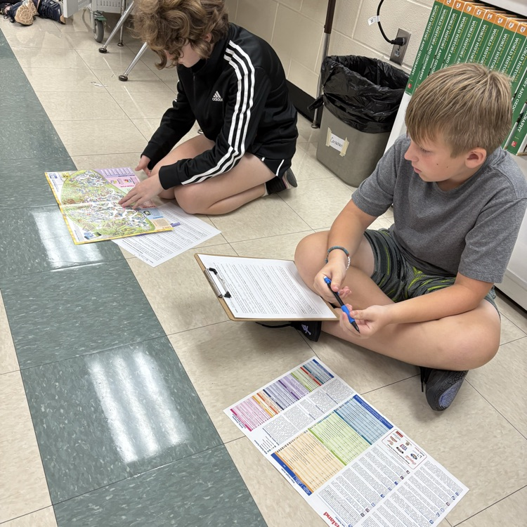 Students in Mrs. Carnahans class work together to use their knowledge of mathematics, reading comprehension, and map skills to complete a Kings Island Cross-Curricular Activity. 