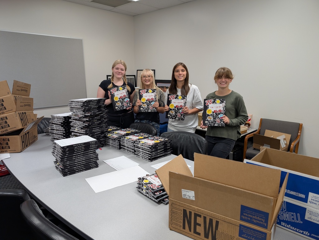 Yearbook staff prepping books for distribution