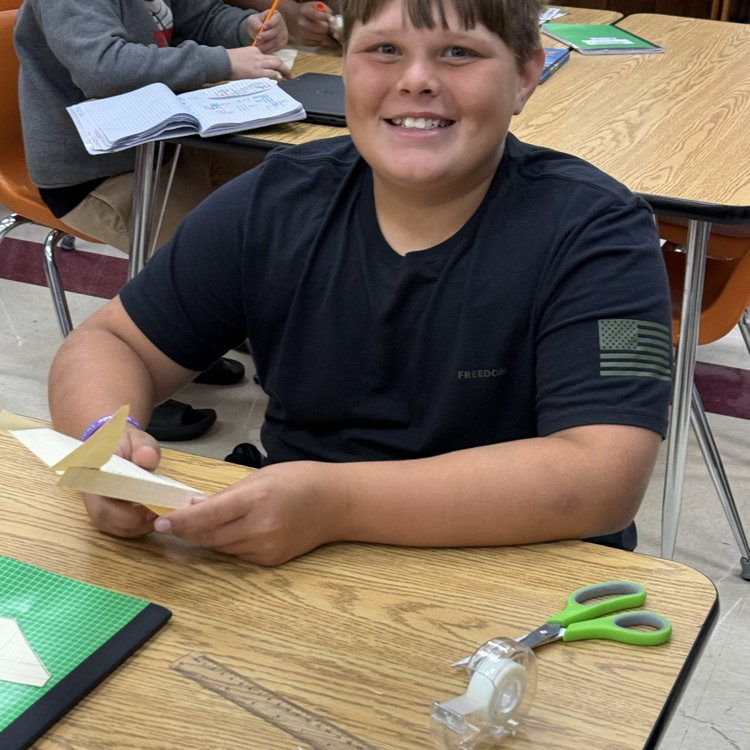 7th grade PLTW using skimmers to work on measurement.