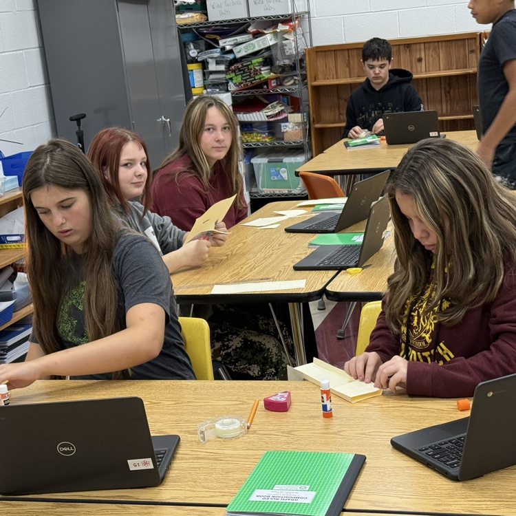 7th grade PLTW using skimmers to work on measurement.