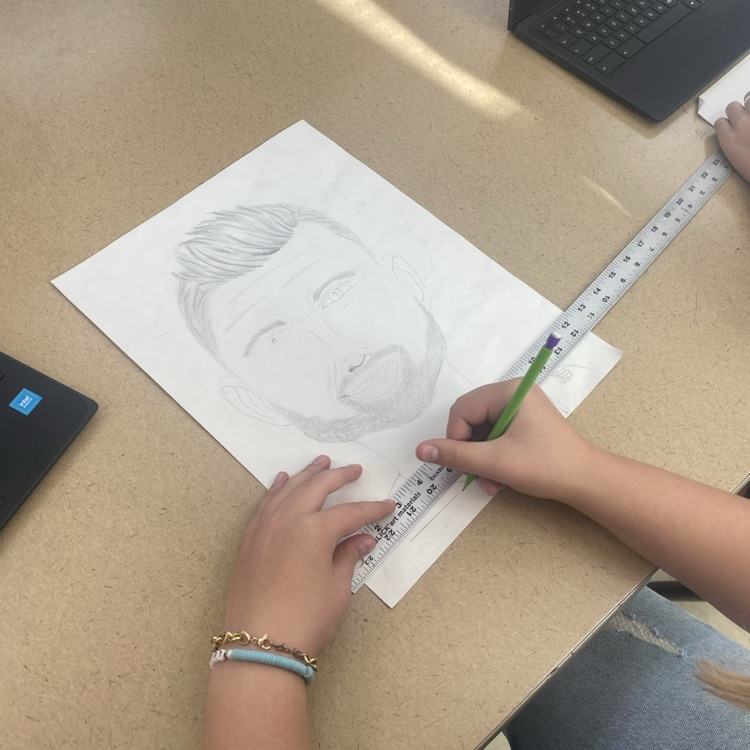 8th grade Art students finishing up on their Celebrity Drawings or A Parody of the American Gothic.