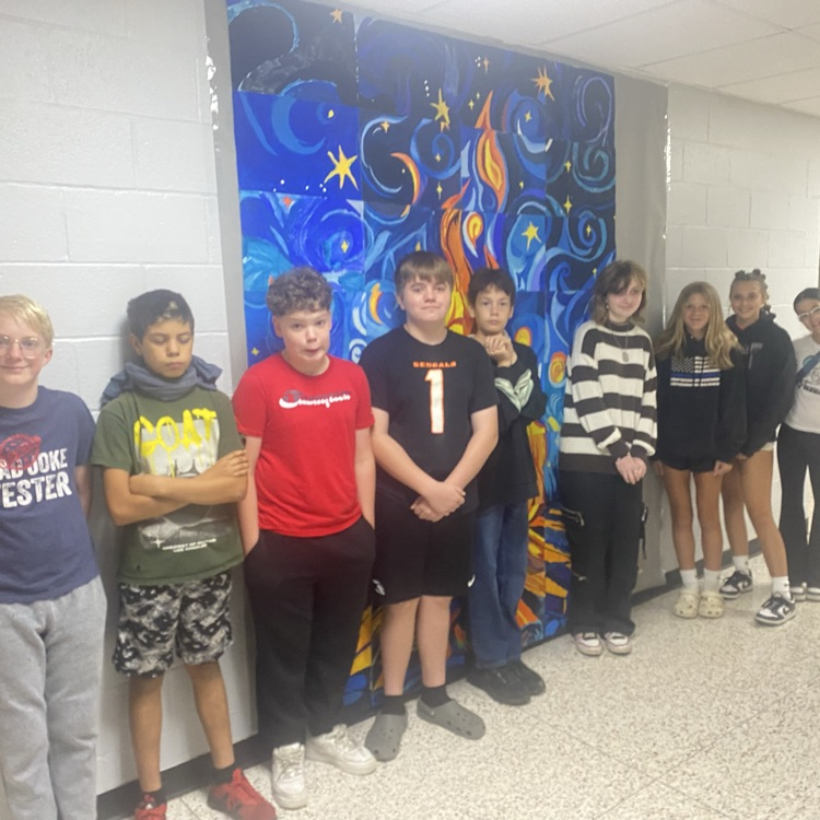 7th grade Art students completed a collaboration with 3 classes to create a grid painting.  They knocked it out of the park!!