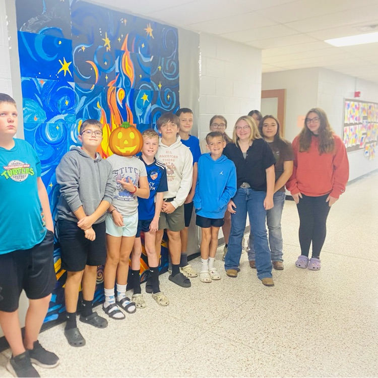 7th grade Art students completed a collaboration with 3 classes to create a grid painting.  They knocked it out of the park!!