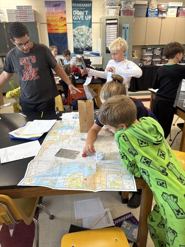 STEM students put the engineer and design process to work and build straw towers. #8389:  STEM students ignite their curiosity as they analyze clues in Mystery Bags to discover expectations in class this year.