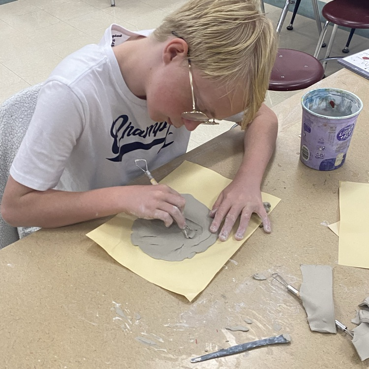 7th grade Art students working on their Clay Junk Food project.