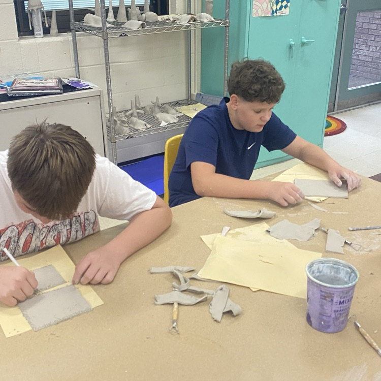 7th grade Art students working on their Clay Junk Food project.