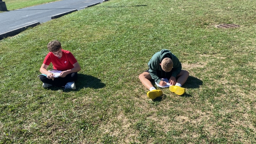 Students solved math problems with rational numbers while enjoying the sun. 