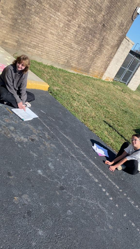 Students solved math problems with rational numbers while enjoying the sun. 