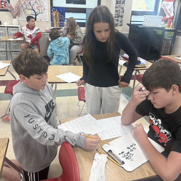 7th graders teamed up to tackle division with rational numbers! They showed off their skills in a fun Quizizz challenge! 