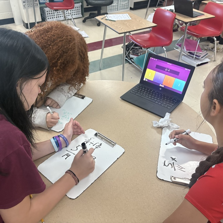 7th graders teamed up to tackle division with rational numbers! They showed off their skills in a fun Quizizz challenge! 