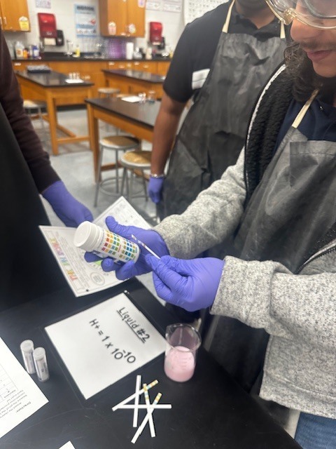 Science students busy with hands on lessons in investigative science