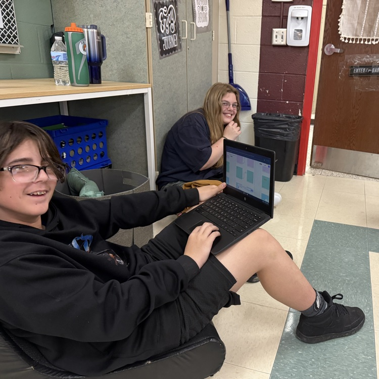 7th grade students reading and listening to “The Tell-Tale Heart” and completing a group discussion after using FigJam.