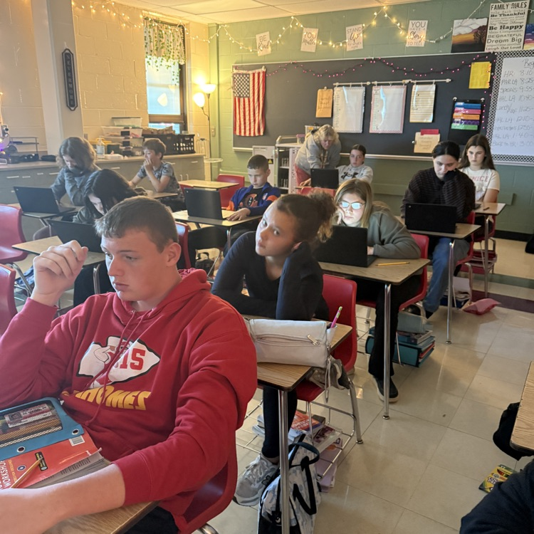 7th grade students reading and listening to “The Tell-Tale Heart” and completing a group discussion after using FigJam.