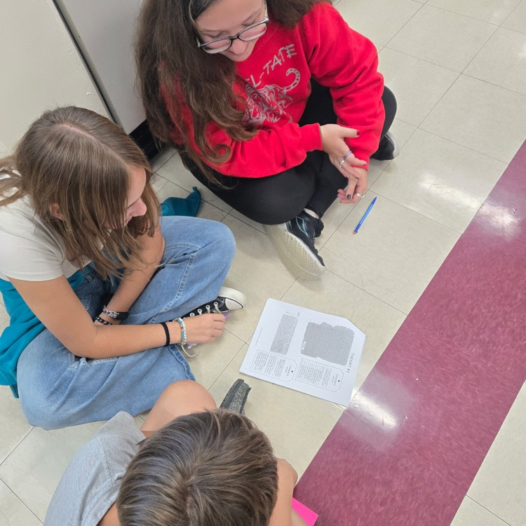 Students examined pieces of evidence and developed theories about what happened to the Lost Colony of Roanoke.