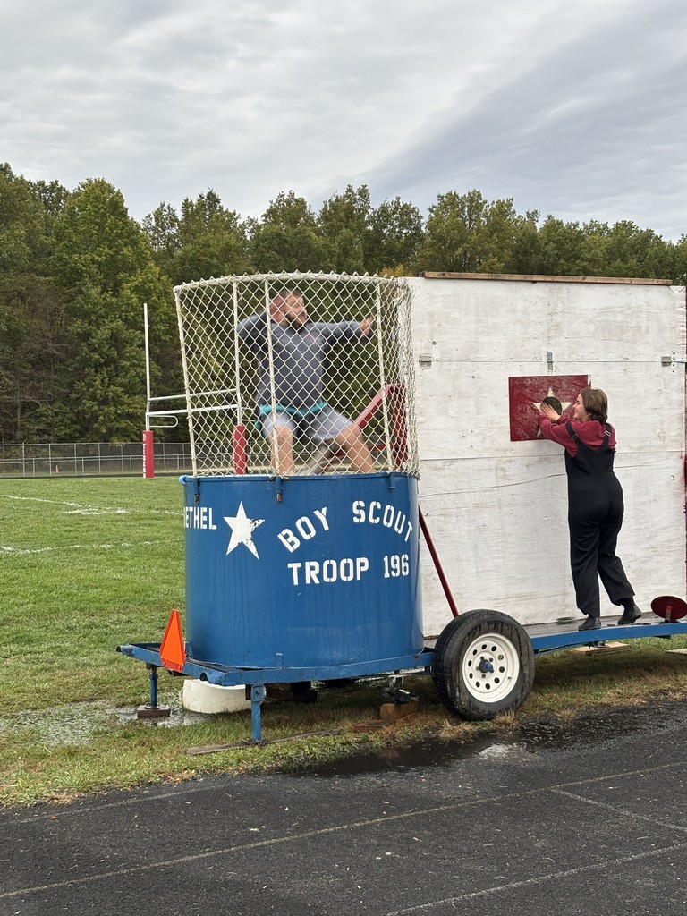 setting up band director dunking booth