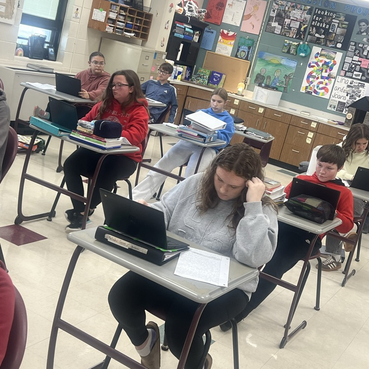 Students are working on replacing existing verbs with more specific, stronger verbs while in Ms. Kincer’s 8th grade ELA class.