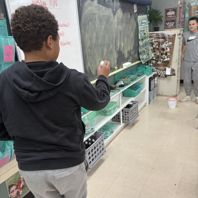 7th graders predicted how many baskets they thought they’d make out of 10, then took 10 real shots to test their accuracy. Using proportions, they calculated their percent error to compare their predictions to their actual results. 