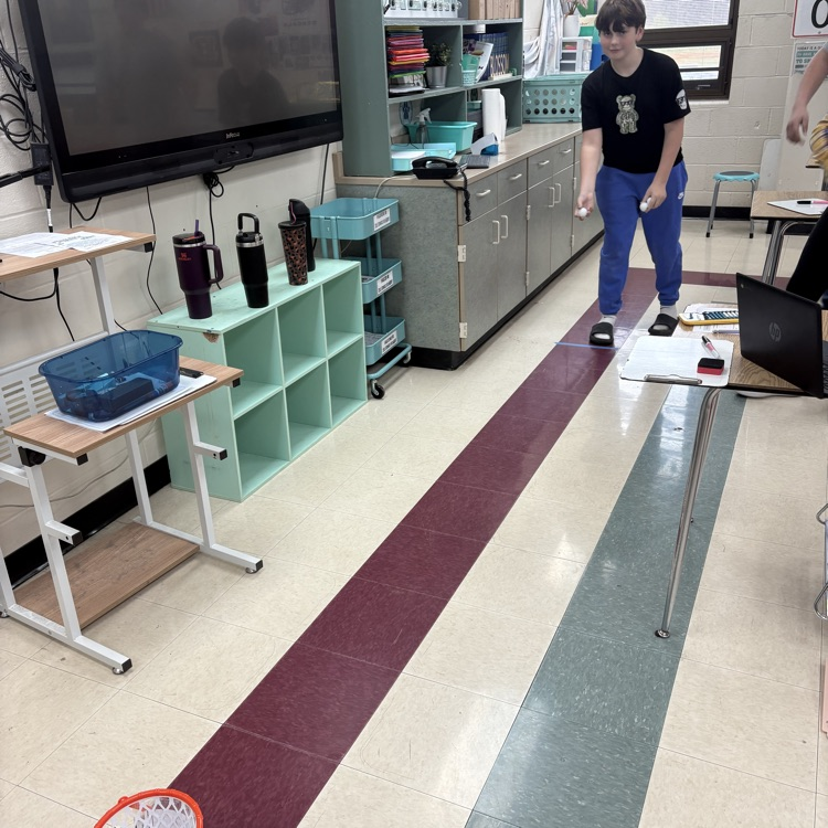 7th graders predicted how many baskets they thought they’d make out of 10, then took 10 real shots to test their accuracy. Using proportions, they calculated their percent error to compare their predictions to their actual results. 