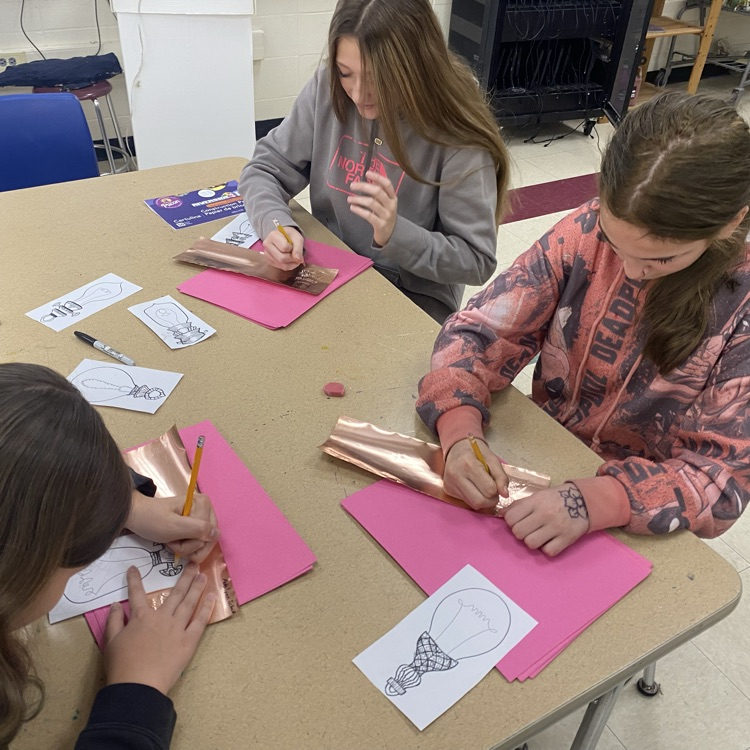 7th and 8th grade Art students creating stunning color chalk lights!