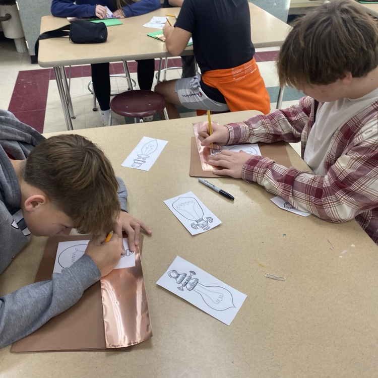 7th and 8th grade Art students creating stunning color chalk lights!