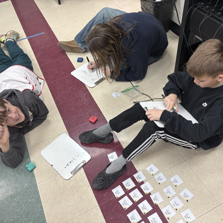 7th grade math students worked in trios using an “I Have, Who Has” activity to actively practice simplifying expressions with the distributive property and combining like terms