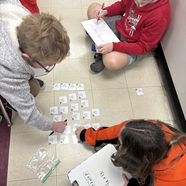 7th grade math students worked in trios using an “I Have, Who Has” activity to actively practice simplifying expressions with the distributive property and combining like terms