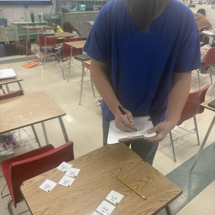7th grade math students worked in trios using an “I Have, Who Has” activity to actively practice simplifying expressions with the distributive property and combining like terms