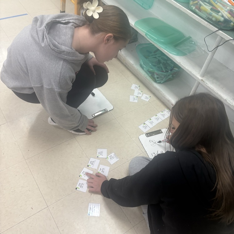 7th grade math students worked in trios using an “I Have, Who Has” activity to actively practice simplifying expressions with the distributive property and combining like terms