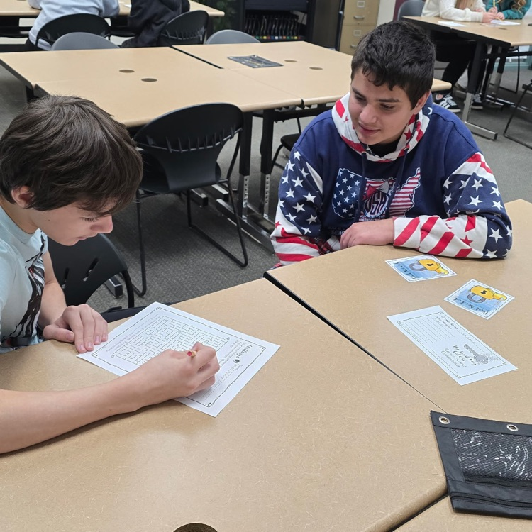 8th graders are saving the world from an alien invasion by completing escape room activities that test their Career and College knowledge. 