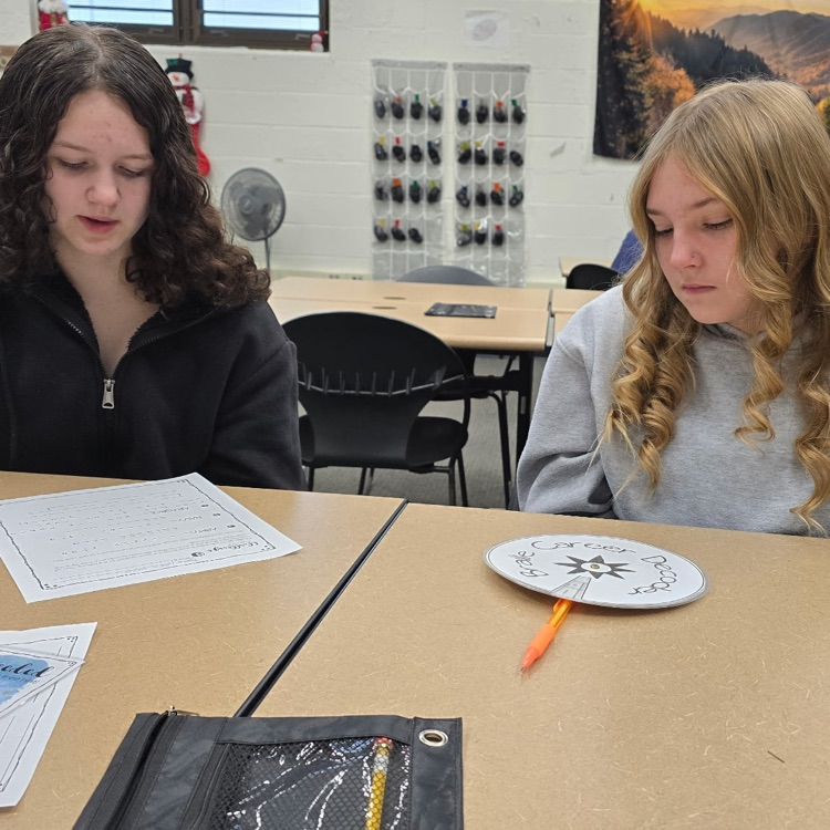 8th graders are saving the world from an alien invasion by completing escape room activities that test their Career and College knowledge. 