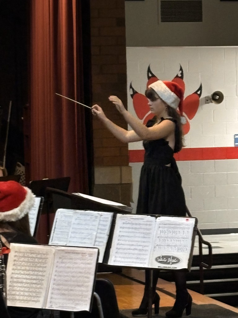 student directing band
