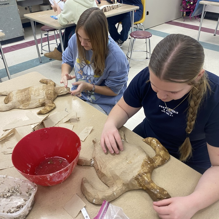 8th grade Art students working on their “Student Choice 3-D Sculpture” projects.