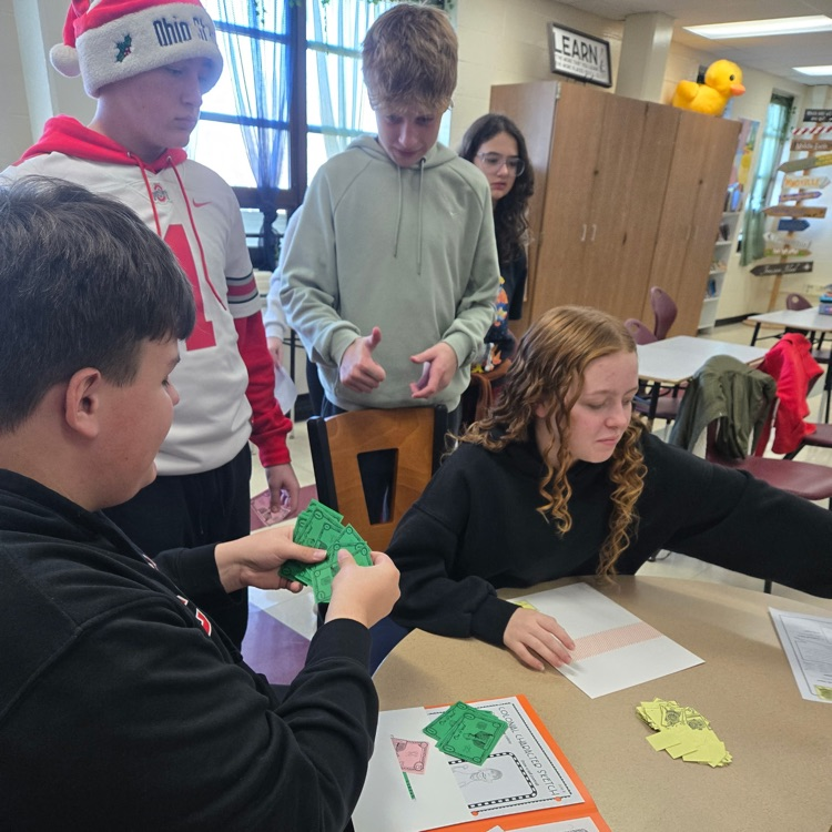 Students are learning about the road to the American Revolution.  The first stop is the Stamp Act. Students had to pay their "tax" to turn in their assignment. Students have also taken on a Colonial identity, complete with a "paying" job. 